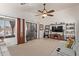 Bright living room with natural light, neutral walls, and tile flooring, creating a comfortable atmosphere at 6002 N 124Th Dr, Litchfield Park, AZ 85340