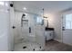 Modern bathroom boasts a glass shower and elegant tiling for a luxurious feel at 6413 E Parkview Dr, Scottsdale, AZ 85257