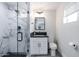 Modern bathroom featuring a glass shower with marble tile, sleek vanity, and contemporary fixtures at 6413 E Parkview Dr, Scottsdale, AZ 85257