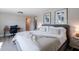 Cozy bedroom with neutral tones, decorative pillows, and a workspace with desk at 6413 E Parkview Dr, Scottsdale, AZ 85257