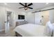 This bedroom boasts a ceiling fan and a dresser for ample storage solutions at 6413 E Parkview Dr, Scottsdale, AZ 85257