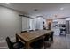 Open concept dining area connecting seamlessly to the kitchen with a sliding barn door at 6413 E Parkview Dr, Scottsdale, AZ 85257