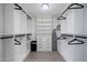 Spacious walk-in closet with custom shelving and plenty of room for storage at 6413 E Parkview Dr, Scottsdale, AZ 85257