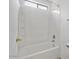 Bathroom offers tub and shower with window for natural light at 7037 W Cavalier Dr, Glendale, AZ 85303