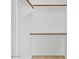 Custom closet featuring multiple levels of rods and shelving for optimal storage at 7037 W Cavalier Dr, Glendale, AZ 85303