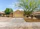Charming single-story home features a two-car garage and well-maintained front yard at 7037 W Cavalier Dr, Glendale, AZ 85303