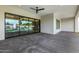 Covered patio and outdoor living area featuring modern design and backyard pool views at 8549 E Indianola Ave, Scottsdale, AZ 85251