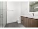 Bathroom features modern shower, sleek vanity and contemporary fixtures at 8549 E Indianola Ave, Scottsdale, AZ 85251