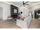 Cozy living room featuring a modern fireplace, comfortable seating, and elegant decor at 8549 E Indianola Ave, Scottsdale, AZ 85251