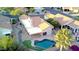 Aerial view showcasing the pool, patio, backyard, and landscaping of the property at 8635 W Country Gables Dr, Peoria, AZ 85381