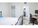 Bedroom with a desk and closet space that maximizes living convenience at 8635 W Country Gables Dr, Peoria, AZ 85381