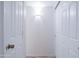 Bright hallway featuring white doors and trim, giving it a modern look at 8635 W Country Gables Dr, Peoria, AZ 85381