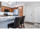 Eat-in kitchen with stainless steel appliances and white granite countertops at 8635 W Country Gables Dr, Peoria, AZ 85381