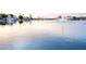 Beautiful lake view with a fountain feature and serene waterfront atmosphere at 8635 W Country Gables Dr, Peoria, AZ 85381
