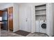 A convenient laundry room with a washer, dryer, storage, and easy access at 8635 W Country Gables Dr, Peoria, AZ 85381
