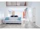 Spacious living area featuring open concept dining room and staircase to the upper level at 8635 W Country Gables Dr, Peoria, AZ 85381