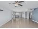 Expansive living room seamlessly flowing into a bright, modern kitchen with stainless appliances at 9609 N 44Th Ave, Glendale, AZ 85302