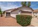 Charming single-story home showcasing a two-car garage and low-maintenance landscaping at 10808 W Ruth Ave, Peoria, AZ 85345