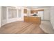 Eat-in kitchen area features a breakfast bar, wood cabinets, and plenty of natural light at 10808 W Ruth Ave, Peoria, AZ 85345