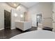 Open primary bathroom with a double sink vanity, glass shower, and neutral finishes with spa-like appeal at 11331 E Cochise Dr, Scottsdale, AZ 85259