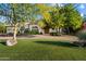 Beautifully landscaped front yard and well-maintained lawn highlight this home's curb appeal at 11331 E Cochise Dr, Scottsdale, AZ 85259