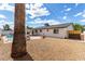 Spacious backyard featuring a refreshing swimming pool and covered patio perfect for outdoor relaxation at 1203 E Bishop Dr, Tempe, AZ 85282
