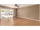 Bedroom featuring laminate wood floors and a sliding glass door at 1203 E Bishop Dr, Tempe, AZ 85282