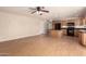 Open-concept kitchen with wood cabinets and an island bar area at 1203 E Bishop Dr, Tempe, AZ 85282