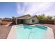 Backyard pool with steps, connected to the home's back patio at 12845 W Milton Dr, Peoria, AZ 85383