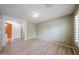 Bright bedroom with neutral paint and wood floors, open to the hallway at 12845 W Milton Dr, Peoria, AZ 85383