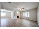 Spacious living room with stylish flooring, neutral paint, and lots of natural light at 12845 W Milton Dr, Peoria, AZ 85383