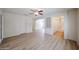 Spacious living room featuring new flooring, arched doorways, and neutral paint at 12845 W Milton Dr, Peoria, AZ 85383