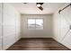 Bedroom with modern design featuring ceiling fan and a sliding barn door at 1539 W 5Th St, Tempe, AZ 85281