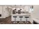 Bright modern kitchen boasts stainless steel appliances and stylish breakfast bar seating at 1539 W 5Th St, Tempe, AZ 85281
