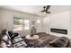 Inviting living room features modern fireplace, ceiling fan, and ample natural light at 1539 W 5Th St, Tempe, AZ 85281