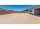 Expansive backyard featuring a block wall and plenty of room to personalize the outdoor space at 16494 W Creedance Blvd, Surprise, AZ 85387