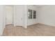 Inviting entryway with tiled floors, a front door, and bright windows at 16494 W Creedance Blvd, Surprise, AZ 85387