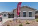 Inviting single-story home with a well-manicured gravel yard and available special financing at 16494 W Creedance Blvd, Surprise, AZ 85387