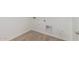 Neutral toned laundry room featuring tile flooring and white walls with utility hookups at 16494 W Creedance Blvd, Surprise, AZ 85387