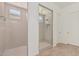 Modern tile shower with glass surround at 16494 W Creedance Blvd, Surprise, AZ 85387
