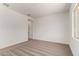 Bedroom with plush carpet, neutral walls and window at 16550 W Creedance Blvd, Surprise, AZ 85387