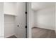 Bedroom featuring a closet to the side with carpeted flooring at 16550 W Creedance Blvd, Surprise, AZ 85387