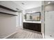 Elegant bathroom with double sinks, walk-in shower, and modern fixtures, offering a spa-like experience at 16840 W Monroe St, Goodyear, AZ 85338