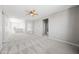 Open bonus room with plush carpeting, recessed lighting and bright natural light at 16840 W Monroe St, Goodyear, AZ 85338