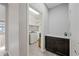 Well-equipped laundry room featuring modern appliances and ample counter space at 16840 W Monroe St, Goodyear, AZ 85338