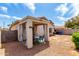 Backyard featuring a covered patio and privacy fence at 16848 W Rimrock St, Surprise, AZ 85388