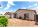 Large backyard features a covered patio area at 16848 W Rimrock St, Surprise, AZ 85388