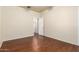 Bright bedroom with hardwood floors and neutral walls at 16848 W Rimrock St, Surprise, AZ 85388