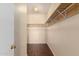 Walk-in closet with shelving and storage space for organized living at 16848 W Rimrock St, Surprise, AZ 85388