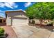 Single-Gathering house with a two-car garage and low-maintenance landscaping at 16848 W Rimrock St, Surprise, AZ 85388
